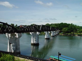 The Bridge over the River Kwai taken in June 2004. The round shaped spans are original, the others have been replaced after demolition.