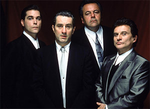 From left to right: Ray Liotta as Henry Hill, Robert De Niro as Jimmy Conway, Paul Sorvino as Paul Cicero, and Joe Pesci as Tommy DeVito.